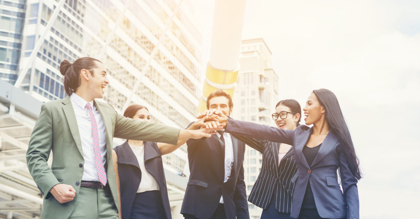 Close up of business people hands together. Teamwork concept. Close up of business people hands together. Teamwork concept.