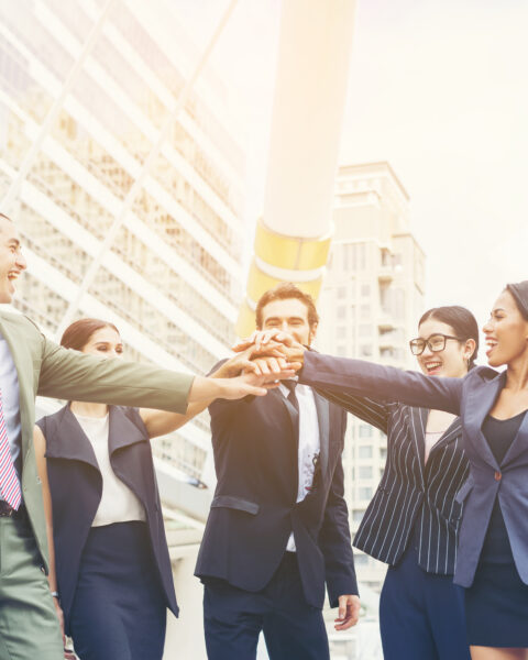 Close up of business people hands together. Teamwork concept.