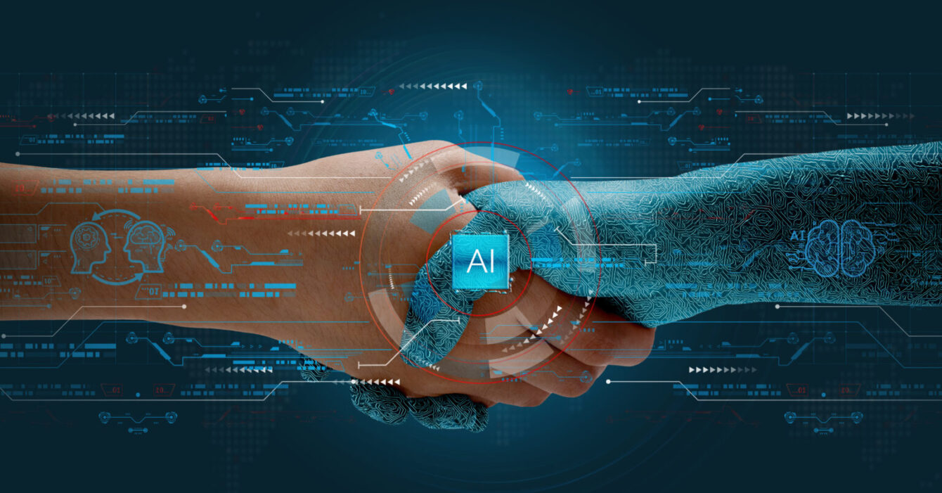 Humans shake hands with AI to show partnership. Machine learning